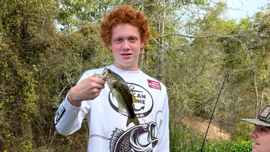 Luke Miller, with partner Nicholas Miller, shows that fishing is hard at tournament time at the October 3 Central Division tourney at Ross Barnett Reservoir.